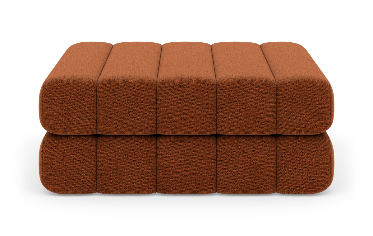 Modulær brun puf/sofa med afrundede kanter i to lag, frilagt produkt set lige forfra.