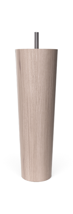 Lys skandinavisk stue med beige sofa, blødt tæppe, planter og gulvlampe i dagslys.