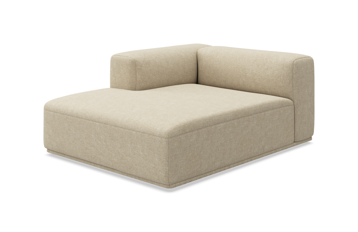 Beige modulsofa hjørnemodul med lav ryg og afrundede former på hvid baggrund.