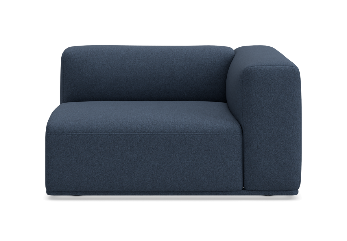 Mørkeblå modulsofa med højre armlæn, frontvisning, frilagt på hvid baggrund.