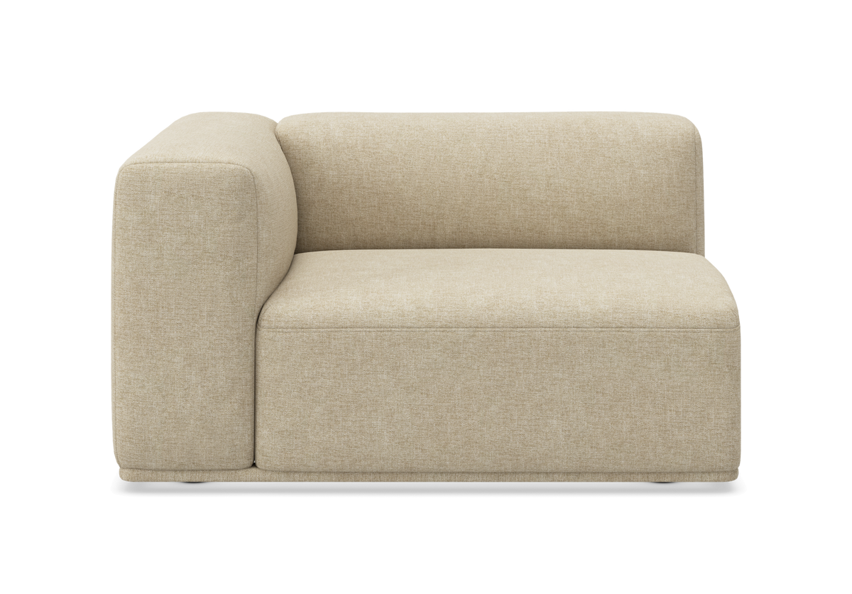 Beige modulsofa, venstrehjørne med lav ryg og afrundede kanter, frilagt produktbillede.