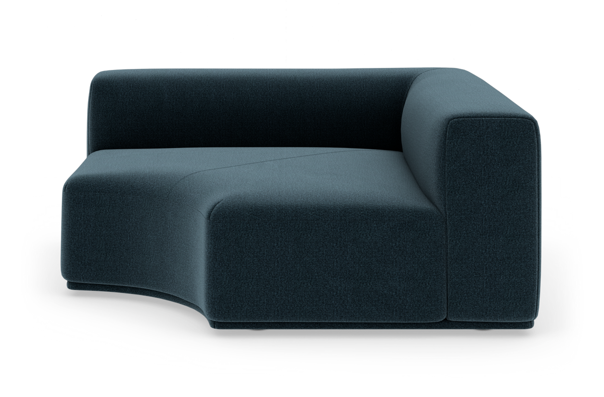Modulsofa i mørkeblåt stof, højre hjørnemodul med rundet sæde, fritlagt på hvid baggrund.