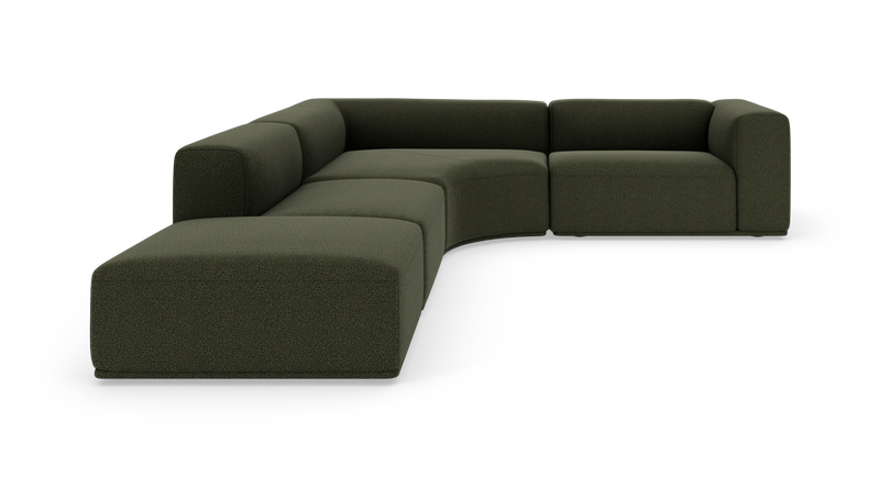 Mørkegrøn modulær hjørnesofa med buet sektion på hvid baggrund._ps
