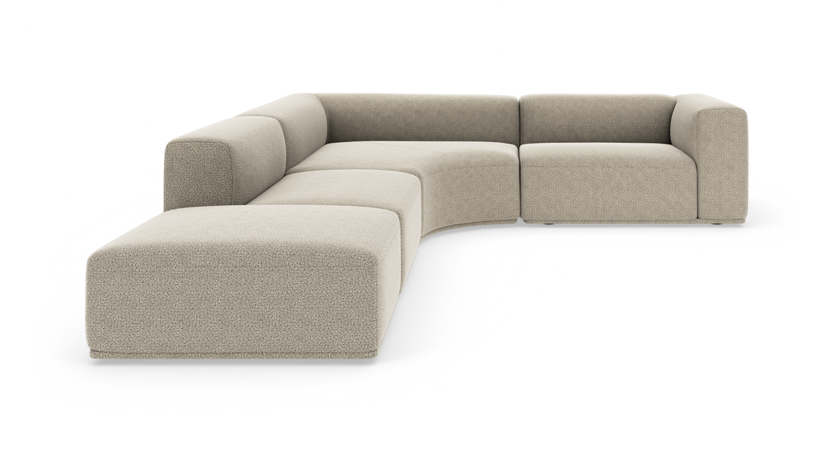 Beige L‑formet modulsofa med afrundede armlæn, fritlagt på hvid baggrund.