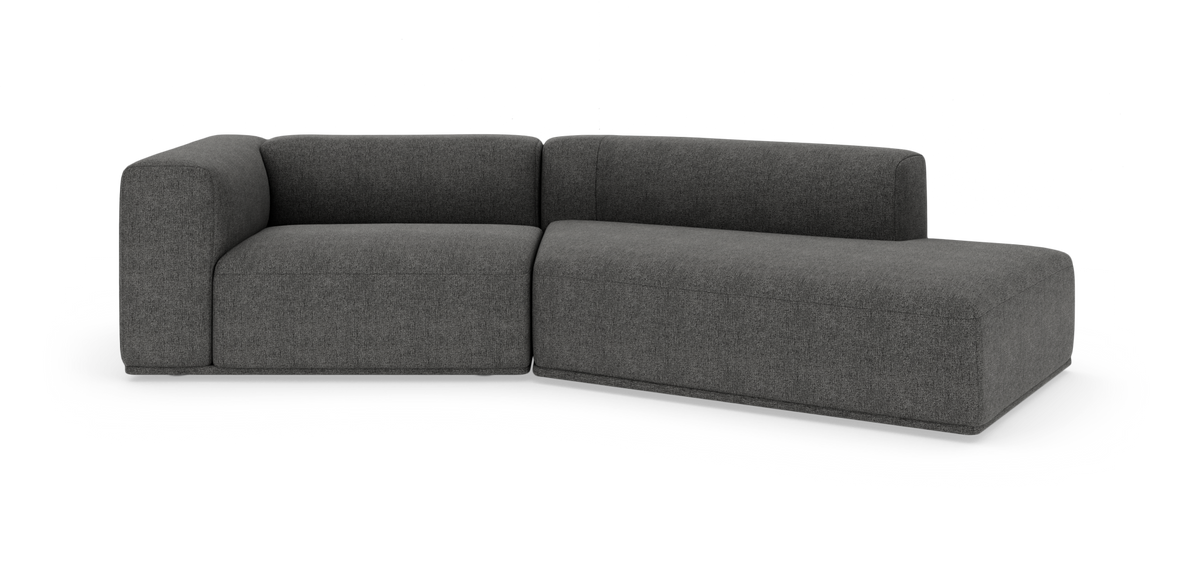 Mørkegrå modulsofa med højre chaiselong i rundet, moderne design.