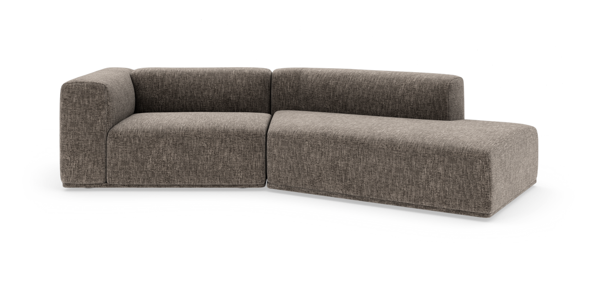 Modulsofa i L‑form i brungråt tekstil med bløde, afrundede former, fritstående på hvid baggrund.
