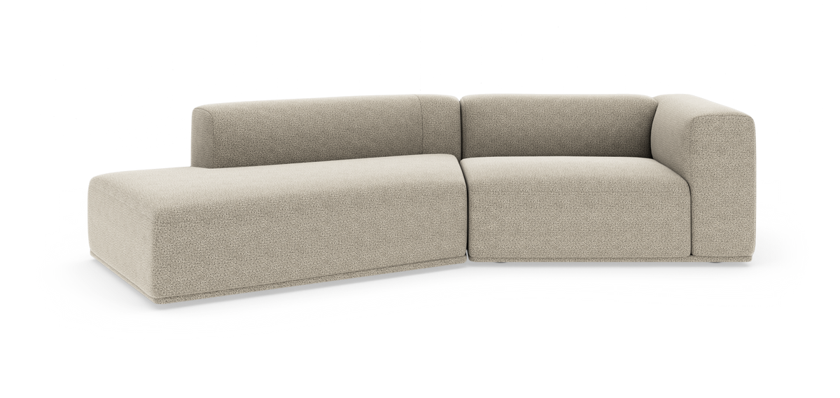 Beige modulsofa i L-form med afrundede linjer på hvid baggrund.