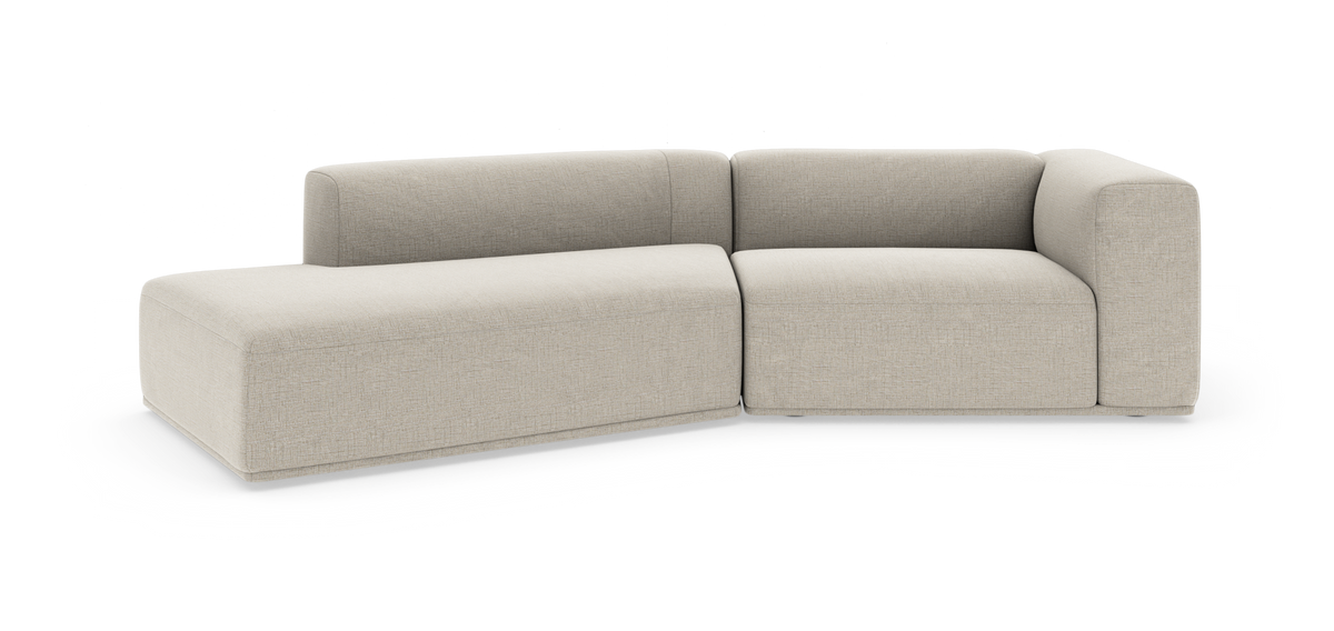 Beige modulsofa med venstre chaiselong i blødt, afrundet, moderne design, frilagt på hvid baggrund.