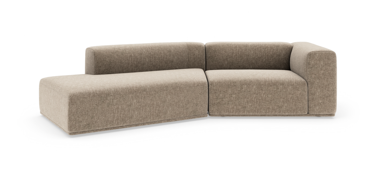 Beige modulsofa i L‑form på hvid baggrund.