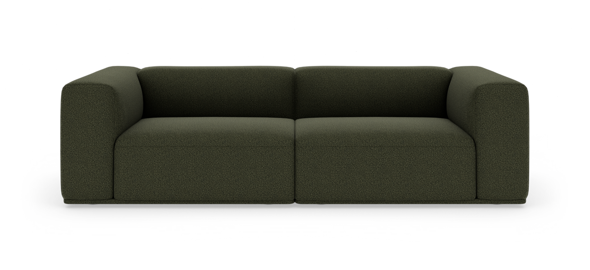 Mørkegrøn, moderne 2-personers sofa med afrundede armlæn på hvid studiebaggrund.