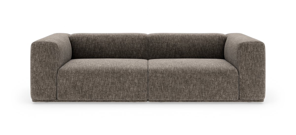 Brungrå, lav modulsofa med brede armlæn, frilagt på hvid baggrund.