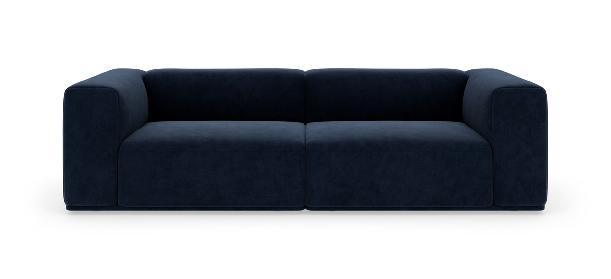 Mørkeblå modulsofa på hvid baggrund, set forfra.