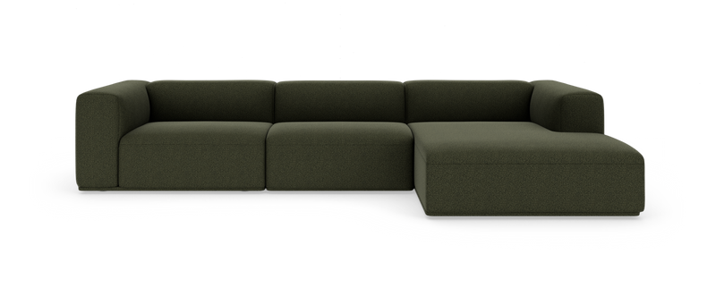 Mørkegrøn modulsofa med chaiselong i højre side, frilagt på hvid baggrund._ps