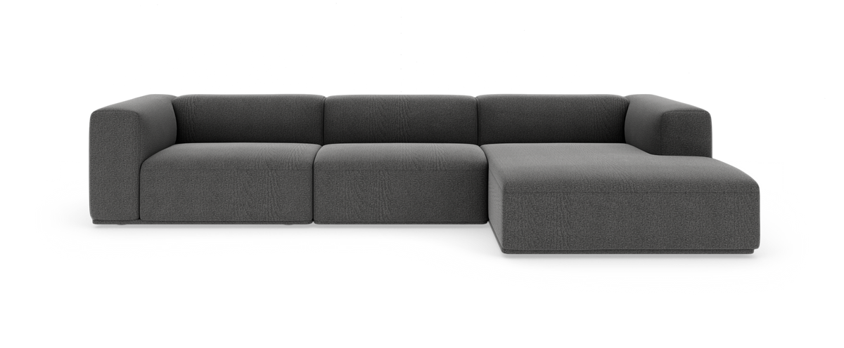 Mørkegrå modulsofa med højre chaiselong, vist på hvid studiebaggrund.
