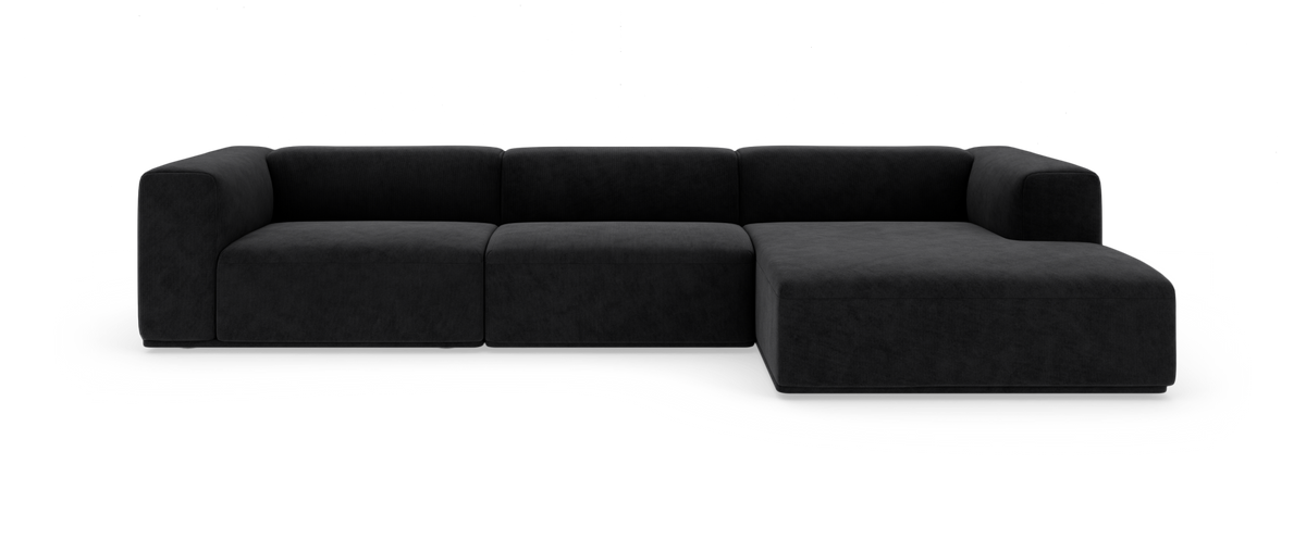 Sort modulsofa med chaiselong til højre set forfra.