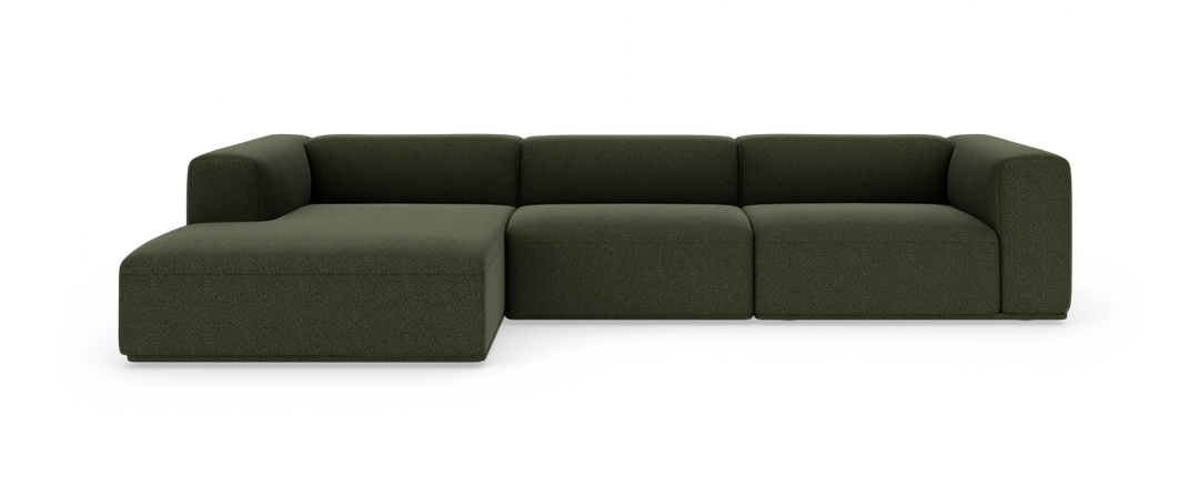 Mørkegrøn modulsofa med venstrevendt chaiselong, fire sæder, på hvid studiobaggrund.