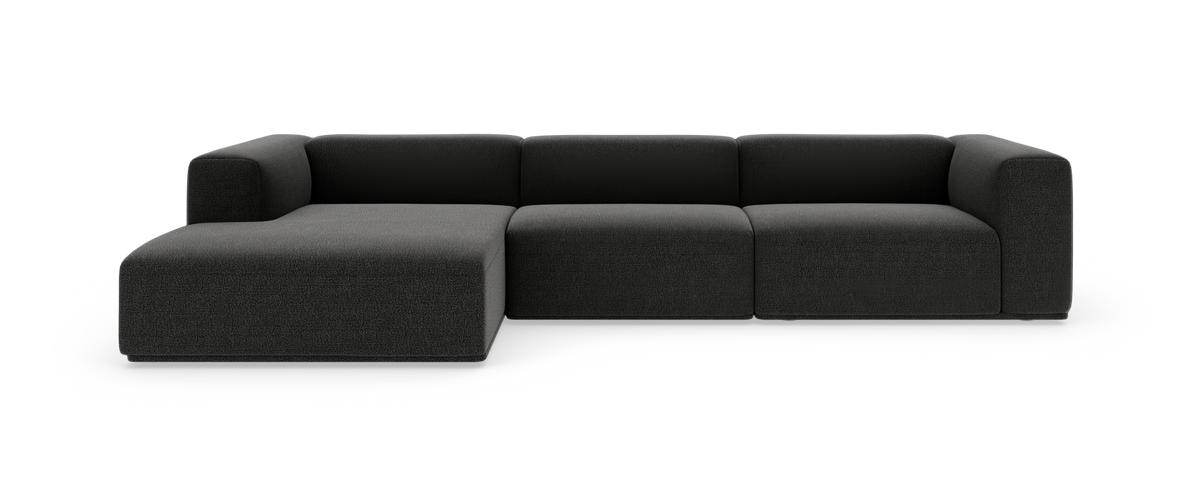 Mørkegrå modulsofa med venstrevendt chaiselong på hvid baggrund.
