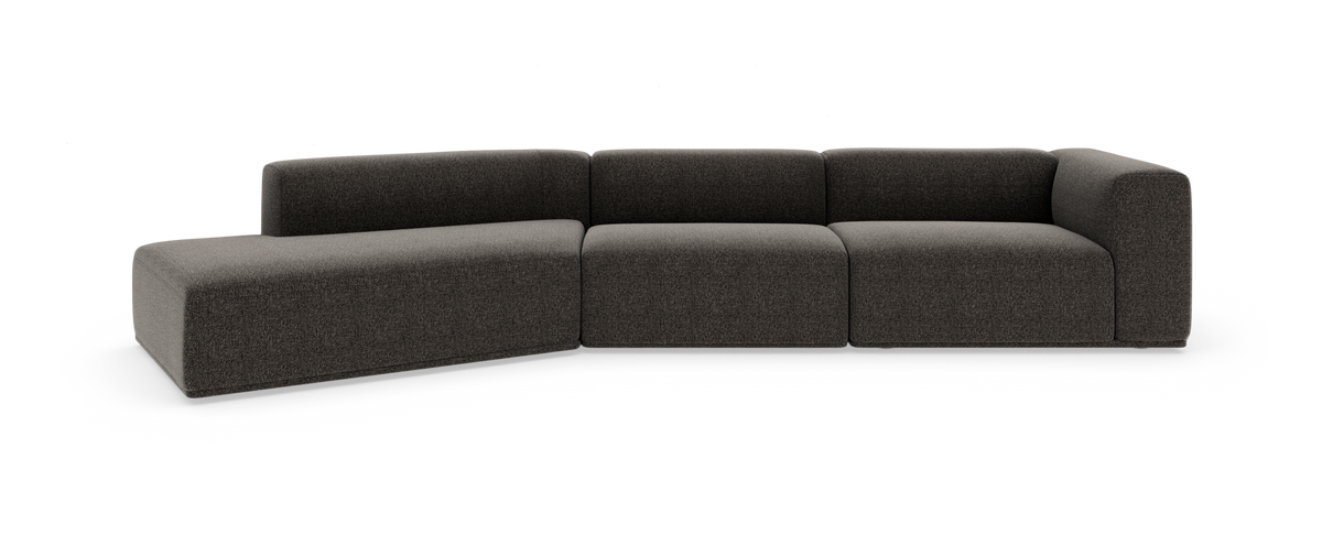 Mørkegrå modulsofa med venstre chaiselong og afrundede hjørner i et moderne, blødt design.