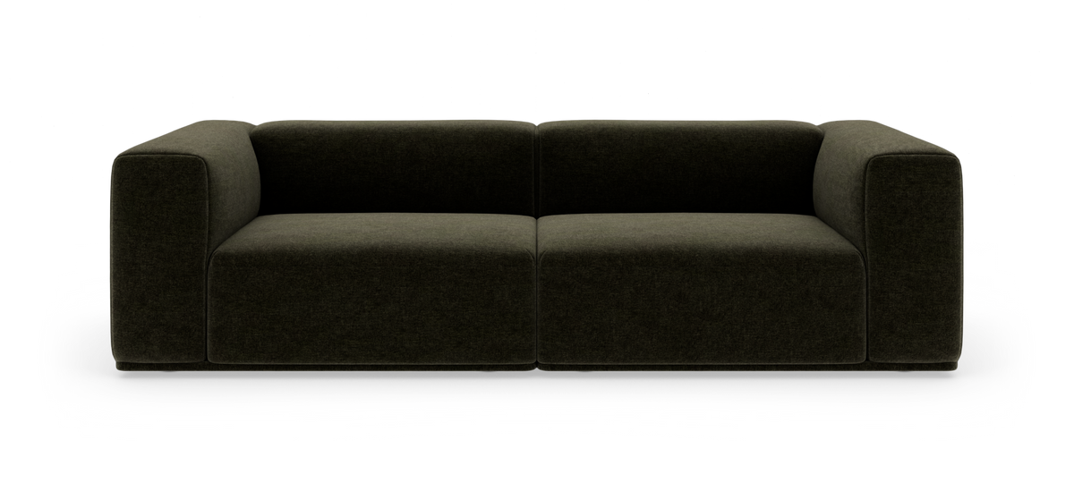 Mørkegrøn modulær 2-personers sofa med afrundede armlæn på hvid studiobaggrund.