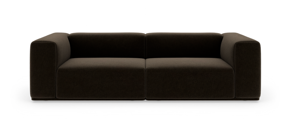 Mørkebrun, moderne tosæders modulsofa set forfra på hvid baggrund.