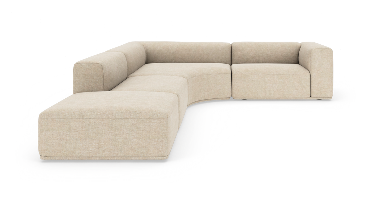 Beige modulsofa i L-form med afrundede hjørner på hvid baggrund.