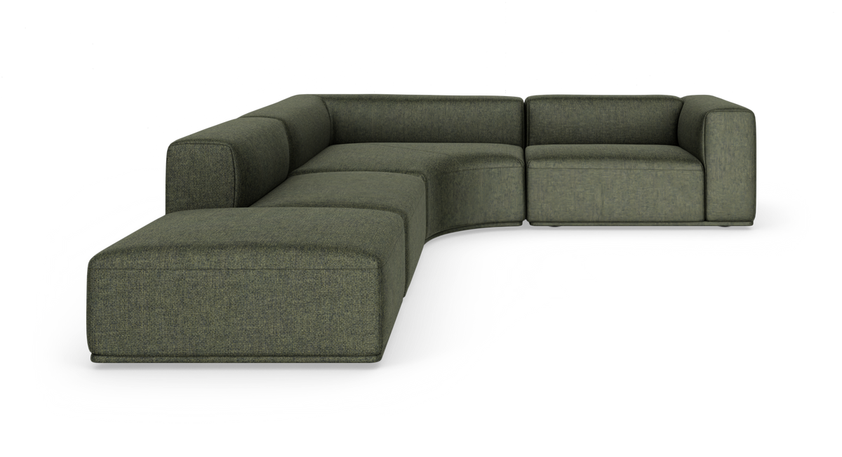 Modulopbygget grøn stofhjørnesofa med afrundede moduler på hvid baggrund.