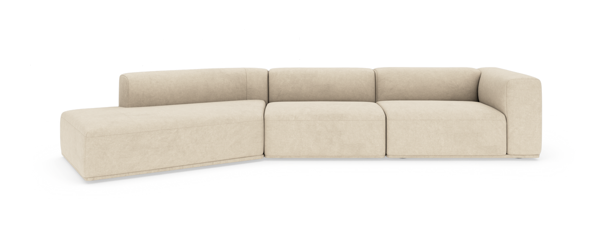 Beige modulsofa med venstrevendt chaiselong og afrundede armlæn, isoleret på hvid baggrund.
