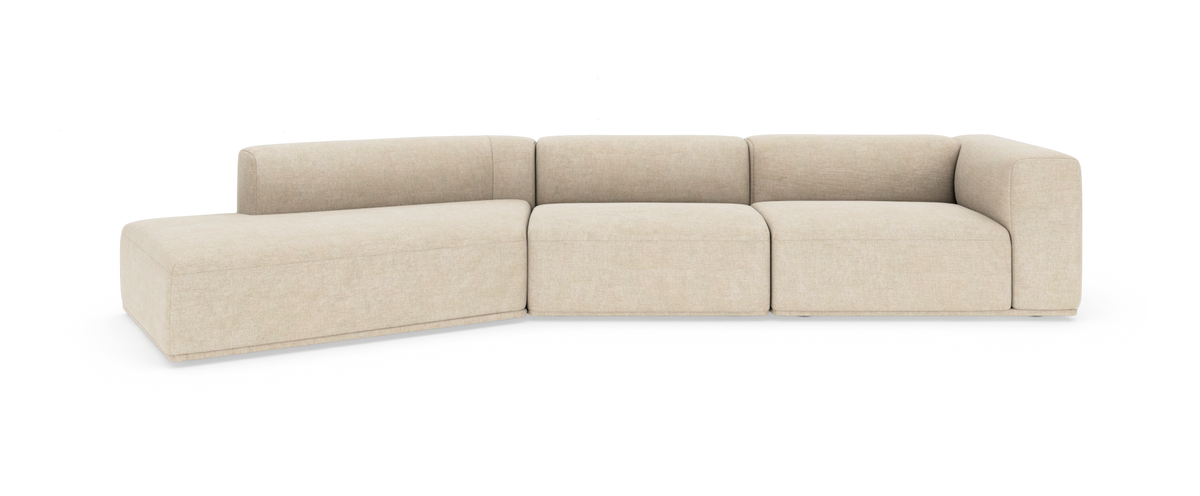 Beige modulsofa i L-form på hvid baggrund.