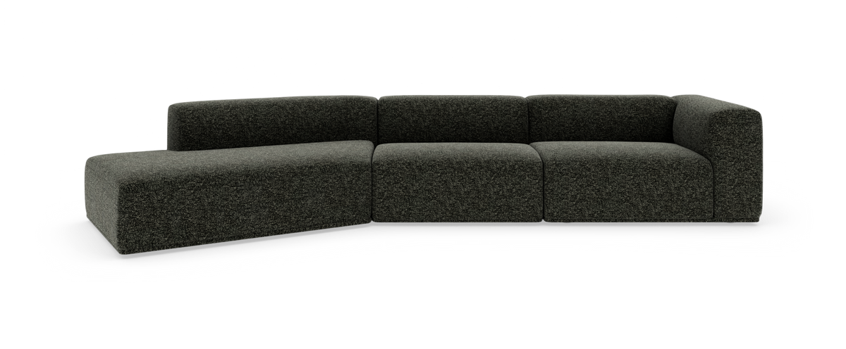 Modulsofa i mørkegråt tekstil med afrundede hjørner og venstrevendt chaiselong, frilagt på hvid baggrund.