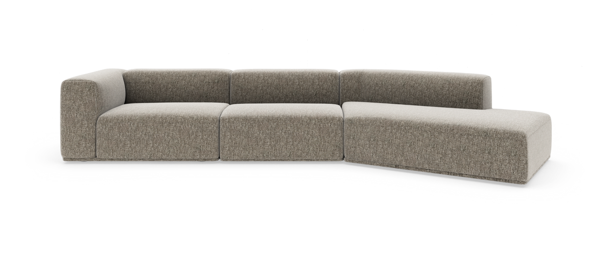 Modulær hjørnesofa i grå-beige stof på hvid studiobaggrund.